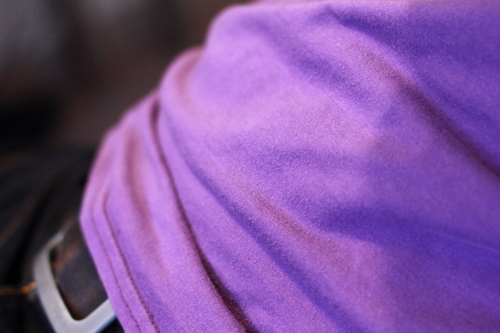 A hem on a T-shirt, made with a coverlock machine